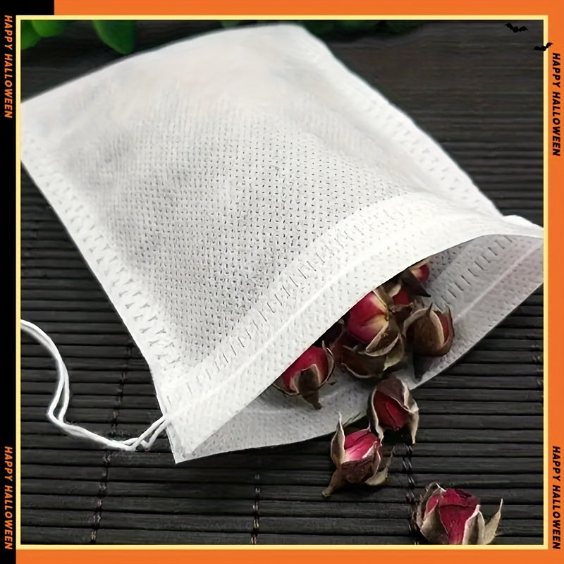 Pack of 100 non-woven tea bags with drawstring, perfect for spices, herbs, and floral teas. Easy to use and made of durable cloth material.