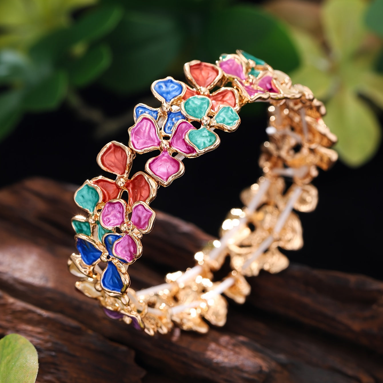 Elegant and timeless, this colorful enamel flower bracelet is made of high-quality zinc alloy. It is designed for women and features a fashionable stretch bangle style that is 18K golden plated. Perfect for daily wear, parties, and holidays, this