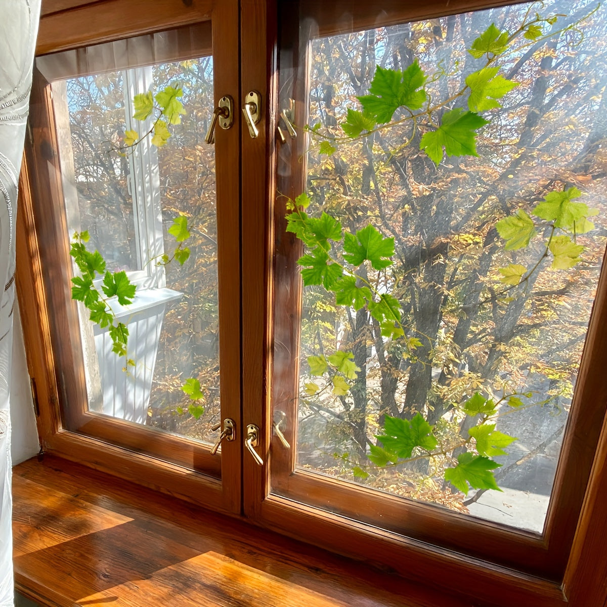 Double-sided 20 Silk Wall Sticker featuring a Simple Maple Leaf Vine design, designed as a Window Sticker. This Static Cling sticker is reusable and made of Polyvinyl chloride material. It has a thickness of 5mil and a Contemporary Style.