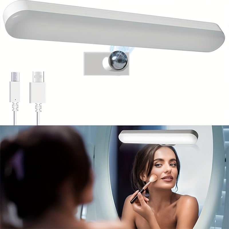 Modern LED vanity mirror lights with 360° rotation, touch-controlled brightness and angle, rechargeable battery, and USB cable. Perfect for makeup application in the bathroom or vanity area. Ideal vanity accessory.