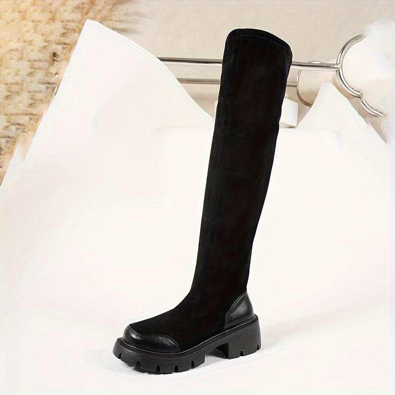 Cozy over-the-knee boots with slimming thigh-high design, chunky heel, plush lining, anti-slip sole, black velvet ribbed texture, and easy slip-on style. Ideal for autumn and winter wear.