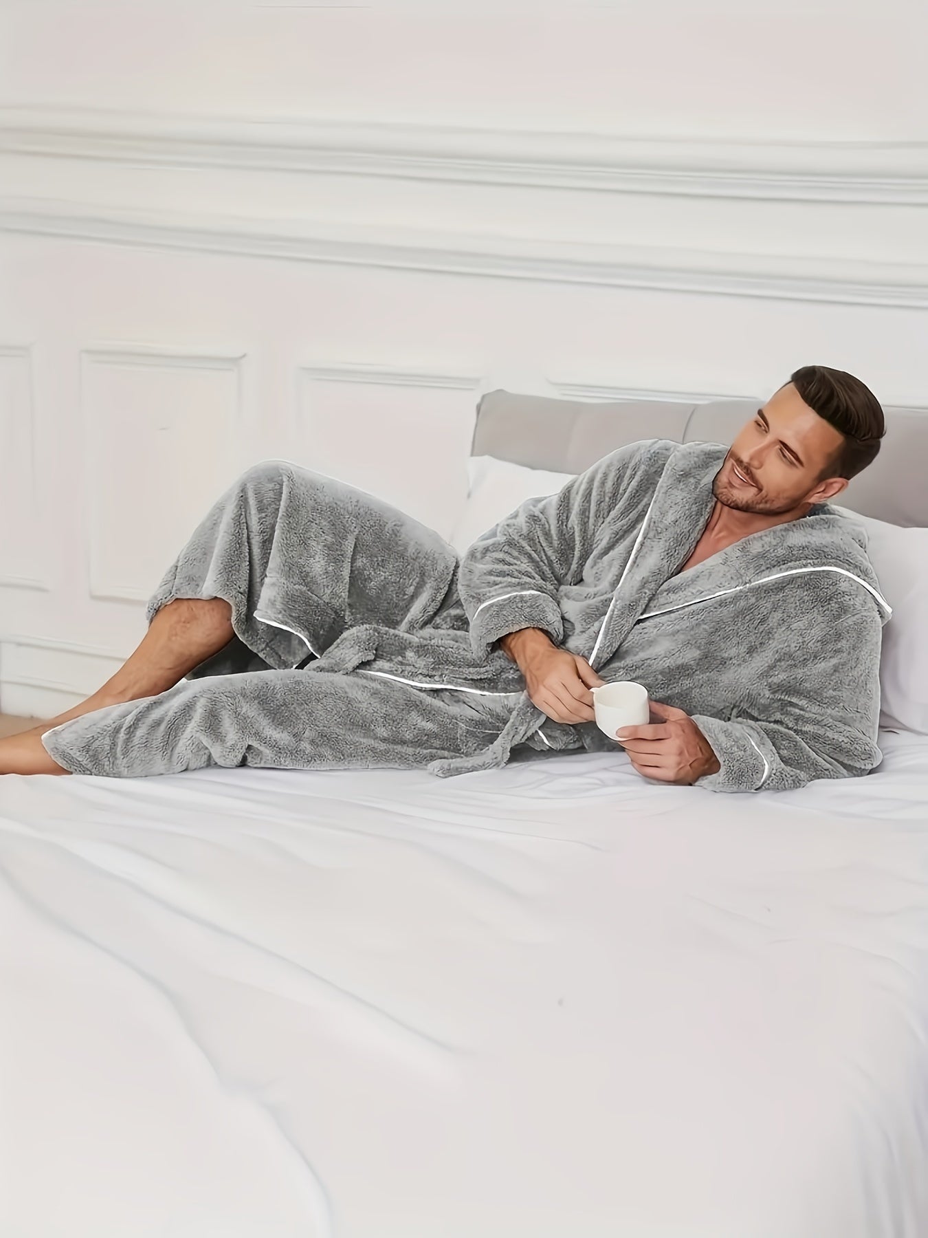 Soft and comfortable black fleece bathrobe with color-block design for men, featuring a hood, long sleeves, and belt detail. Suitable for home and hotel use, machine washable.