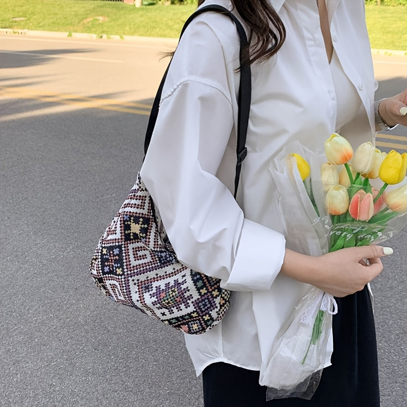 Single shoulder tote bag from the new spring and summer collection, perfect for daily use. Features stylish and versatile design with random zip direction and pattern printing.