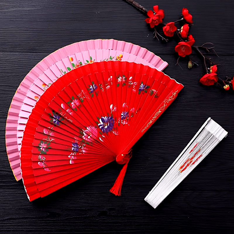 Wooden Spanish folding fan for dancing and home decoration with printed design, conveniently folds for easy storage.