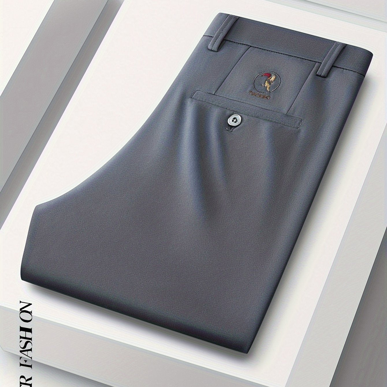 Stretchy black dress pants with bird emblem for men, slim fit, machine washable for business casual and social events.