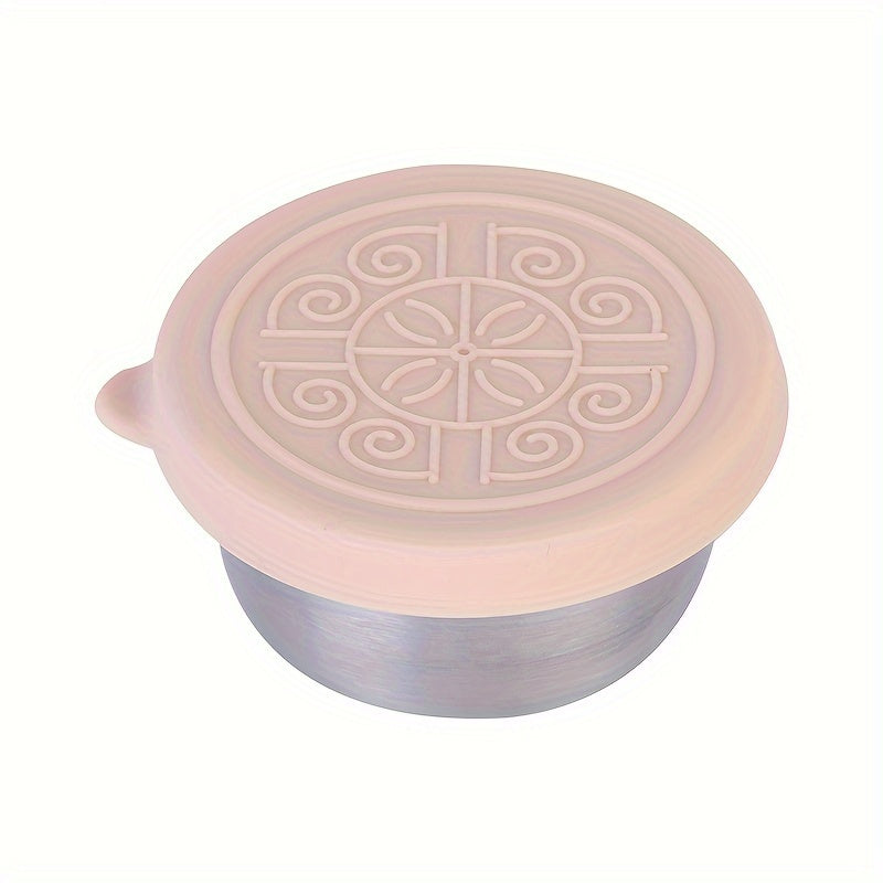 Stainless steel condiment cup with silicone lid. Leakproof and rust resistant. Flower pattern in holiday theme. Includes box. Multicolor.