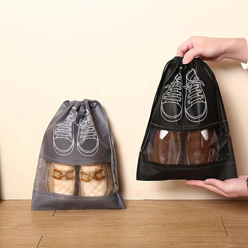 5 Portable shoe storage bags with drawstring made of waterproof, non-woven fabric for travel and closet organization.