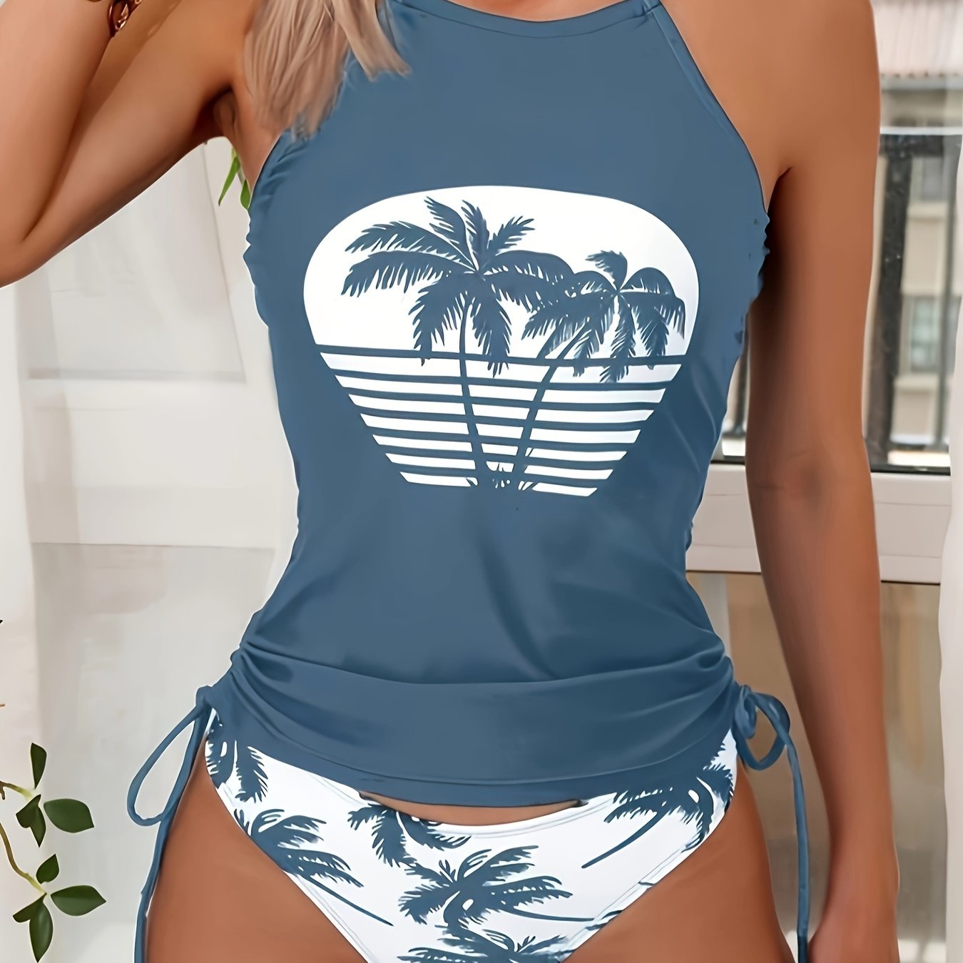 Padded bra swimsuit with palm tree print.