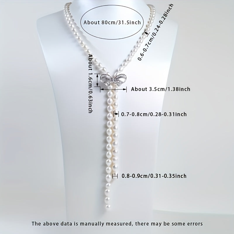 MUFAN Elegant Luxury Pearl Necklace features Natural Freshwater Pearls 6-9mm with Synthetic Zirconia Inlay. It has a Bowknot Tassel Design and is free from plating. This necklace is perfect for daily wear and gifting, as it is June Birthstone Compatible