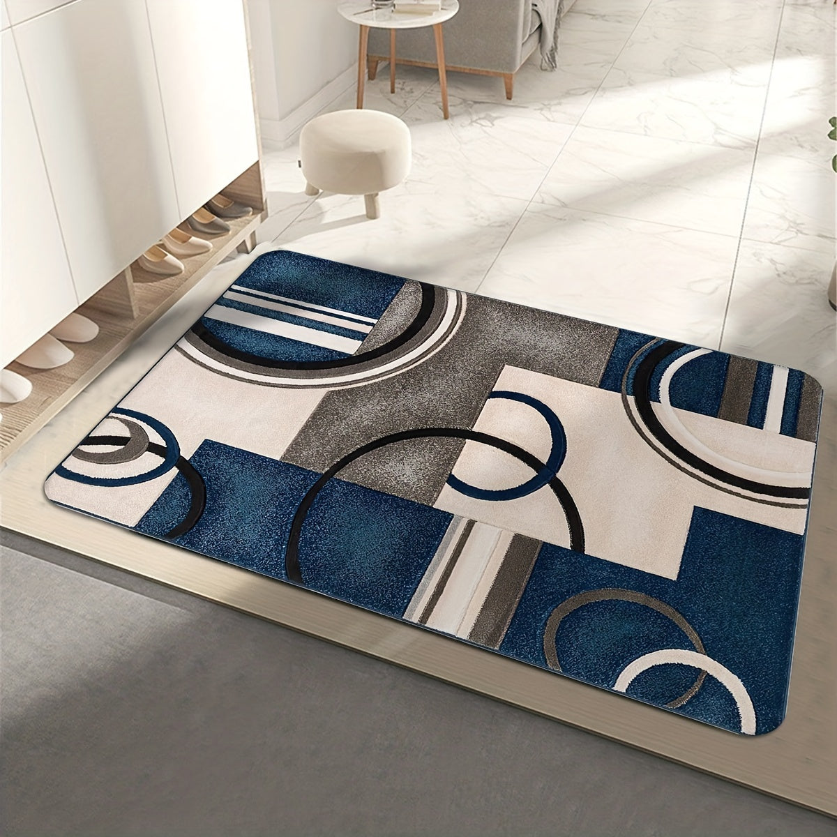 This home entryway mat is made of non-slip, absorbent polyester material. It is available in three sizes: 39.88x59.69 cm, 49.78x79.76 cm, and 44.7x119.38 cm.