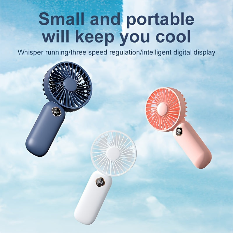 Portable table fan with USB charging and phone holder, lithium battery, quiet operation, 3 speeds, suitable for indoor use. Features intelligent digital display, made of plastic with button control and various components.