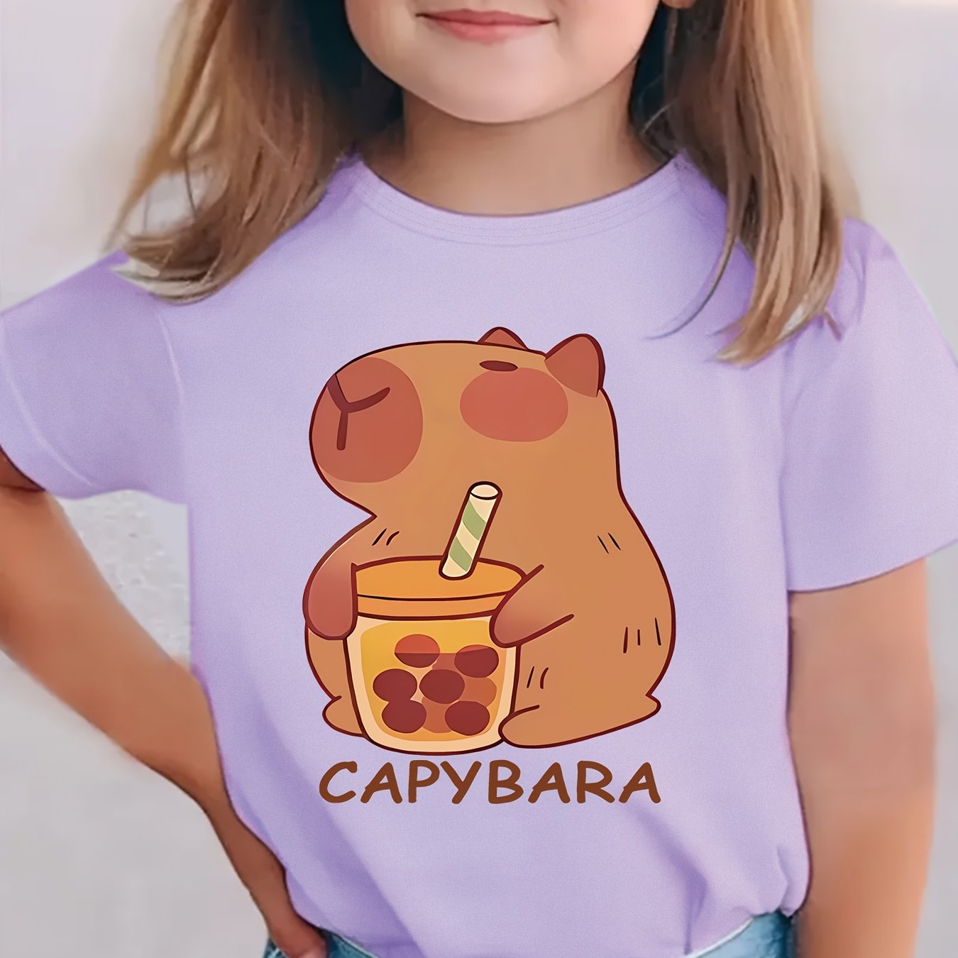 Girls' cozy round neck t-shirt with capybara drinking milk tea pattern, perfect for spring and summer.