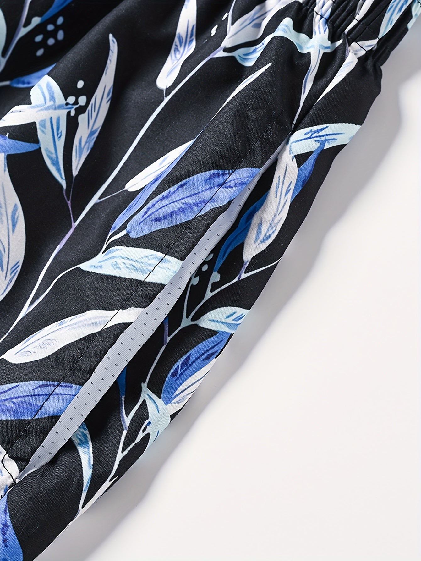 Tropical trees print board shorts for big and tall men, perfect for summer and outdoor sports.