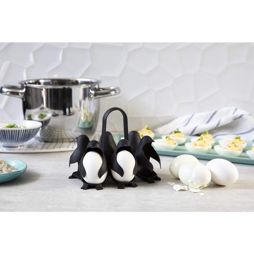 This penguin-shaped egg rack is perfect for cooking, storing, and serving your eggs. It can hold up to 6 eggs and is designed for making soft or hard-boiled eggs. The convenient design makes it ideal for both cooking and refrigerator storage.