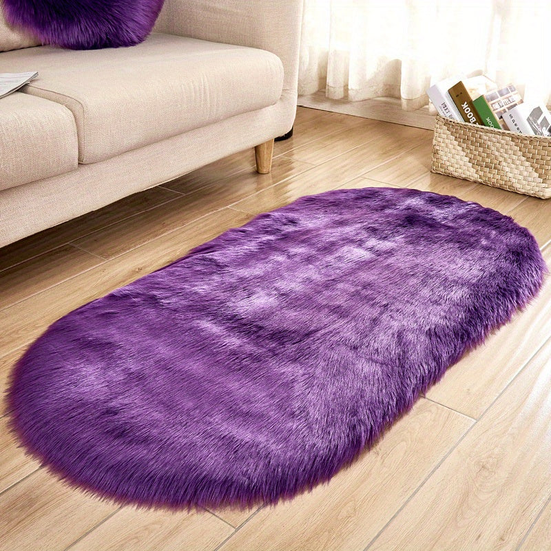 One piece of a luxurious Super Soft Area Rug, featuring a Plush Fluffy Faux Sheepskin design in an Oval shape, perfect for adding warmth to your Living Room or Bedroom. This Machine Washable Bedside Rug is made of Shaggy Plush Carpet Faux material, ideal