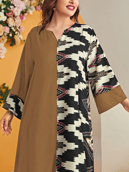 Elegant plus size geometric kaftan dress in black and beige houndstooth pattern with floral accents. Made of polyester, machine washable, with V-neck, long sleeves, and flowing silhouette