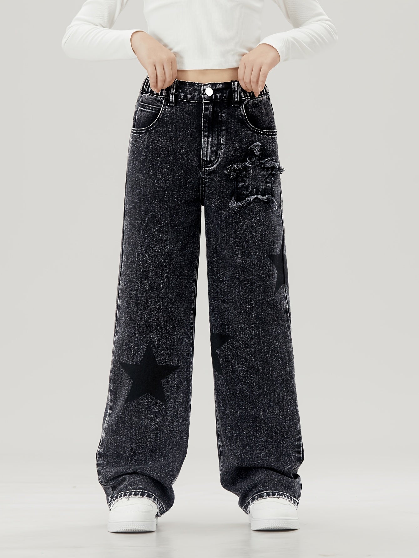 Youngsters' wide-leg denim jeans with star pattern, elastic waistband, comfort fit, machine washable. Perfect for everyday outings and comfortable playwear. Nonstretch denim.