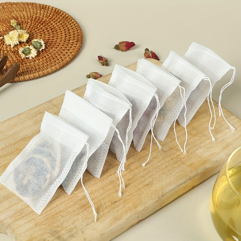 100 pieces of Disposable Drawstring Tea Bags for Loose Leaf Tea, perfect for use in restaurants, hotels, family gatherings, theme parties, weddings, and birthday parties.