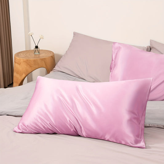 Luxuriously soft bedding for your bedroom, this hypoallergenic satin pillowcase is made of 100% polyester. It is breathable, skin-friendly, and features a solid color with envelope closure. Easy to care for, it is machine washable for added convenience.