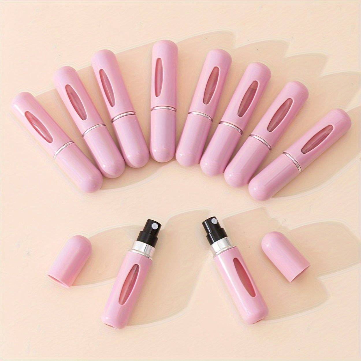 10 count of 5ml portable fine mist spray bottles for perfume, oil, cologne, and liquid. Easy-pump design for convenient travel refill.