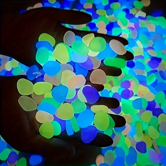 100 glow-in-the-dark pebbles for aquariums, gardens, and outdoor decor, ideal for adding a colorful and luminous touch to your space. Perfect for fish tanks and aquarium decorations.