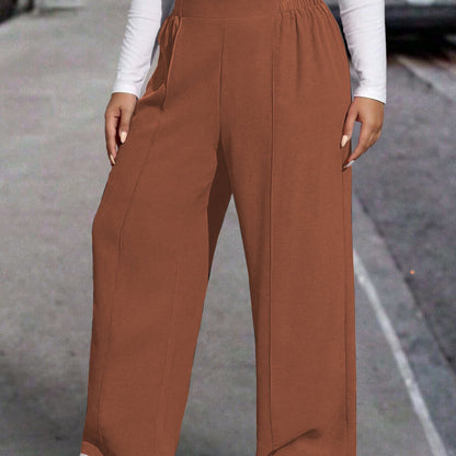 New stylish large women's pants, extended and loose fit, comfortable and light, in a sleek solid color.