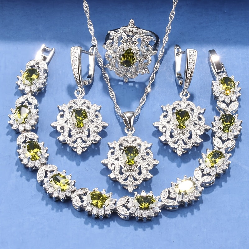 Luxurious and elegant jewelry set featuring 5 pieces in 18K gold plated copper, adorned with synthetic emerald and cubic zirconia. Set includes earrings, necklace, pendant, ring, and bracelet, perfect for both daily wear and special occasions. A stunning