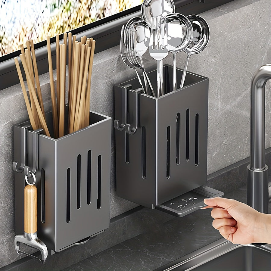 Organize your kitchen with this convenient wall-mounted storage rack! Made of durable plastic, this utensil holder features a chopstick cage with a drain tray, perfect for storing cutlery, knives, forks, spoons, sponge brushes, and more. No electricity