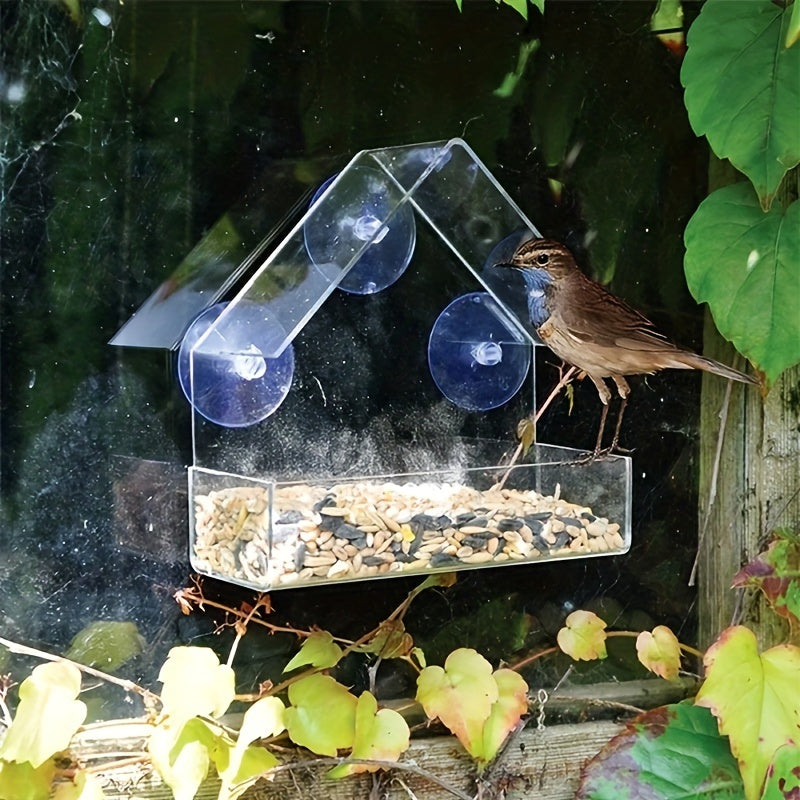 Durable clear acrylic bird feeder with suction cup for all bird species, easy to clean and perfect for window installation.