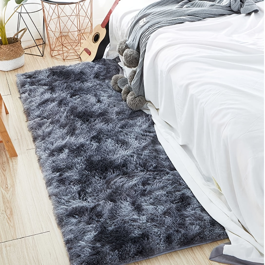 One piece of plush, fluffy area rug designed for bedrooms. This soft, fuzzy shaggy rug is black in color and rectangular in shape, perfect for adding warmth to your living room. It features a non-slip bottom to ensure safety. Great for Halloween or