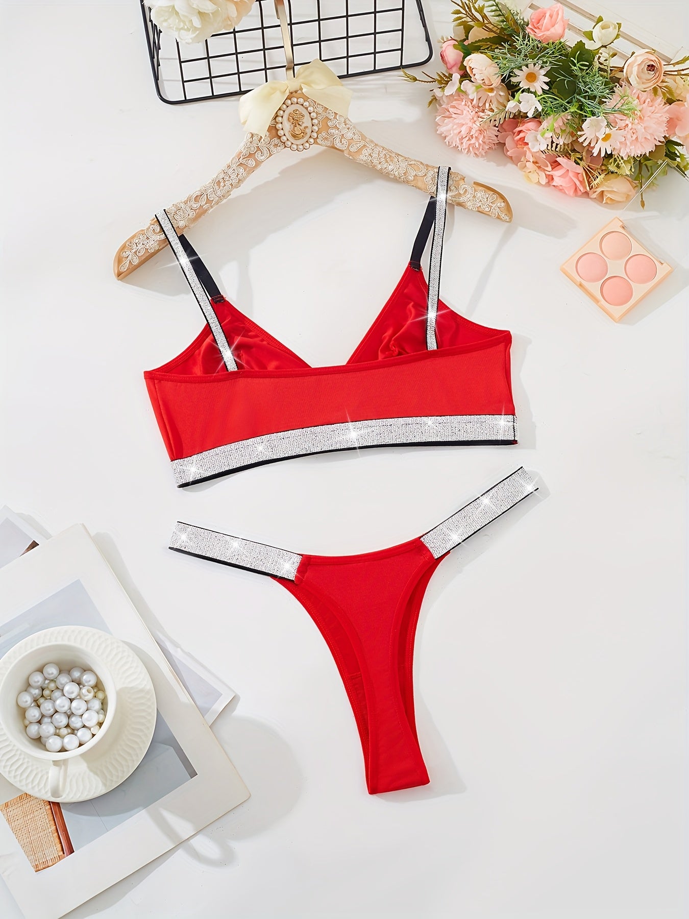 Strappy silver lingerie set for elegant women, high fashion casual wear in polyester knit, solid color bralette and thong.