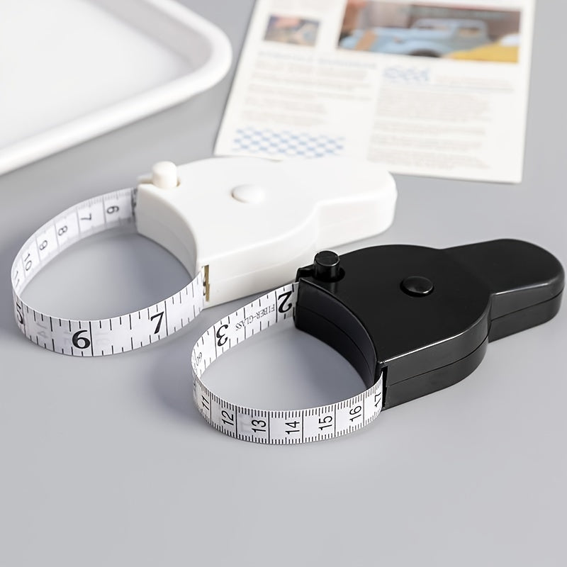 1pc 60-Inch Retractable Measuring Tape for waist, chest, and thigh circumference. Home use, with locking mechanism, made of plastic material. Dimensions: 8.99 x 5.49 cm.