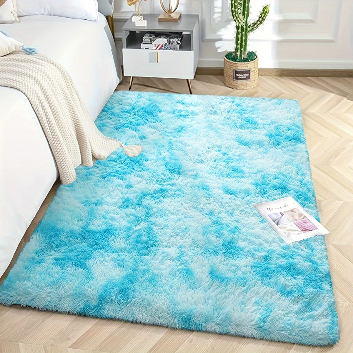 Soft, fluffy shag area rug perfect for living room or bedroom decor. This non-slip machine washable carpet adds luxury and coziness to any space.