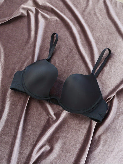 Sleek black push-up bra with deep V neck, thick cushioned support, non-removable pads, nylon & spandex blend, hand washable. Perfect for a chic, supportive, and shapely look. Includes