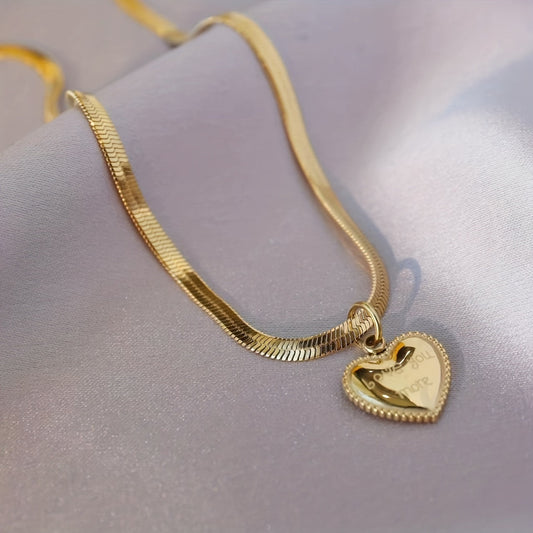 Stylish Heart Pendant Snake Chain Necklace for Women, featuring 18K Gold Plating and sleek 316 Stainless Steel. Perfect for everyday wear or as a thoughtful gift. This necklace does not have any stone inlay.