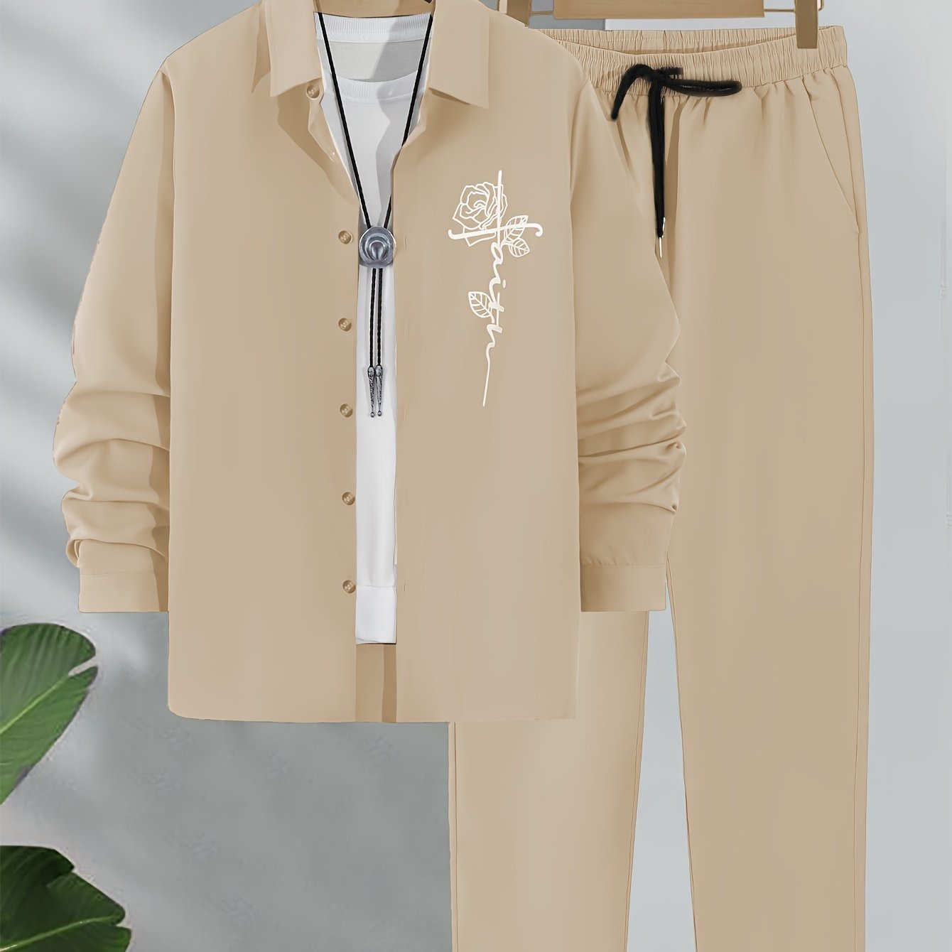 Men's printed casual shirt and drawstring trousers set.