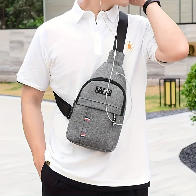 Black men's Oxford sling bag with adjustable strap, multiple compartments, and casual sports style for outdoor travel.