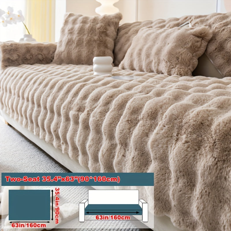 Faux rabbit fur sofa cover for cozy winter warmth. Pet-friendly, machine washable. Fits single to four-seater sofas. Perfect for living room, bedroom, office decor.