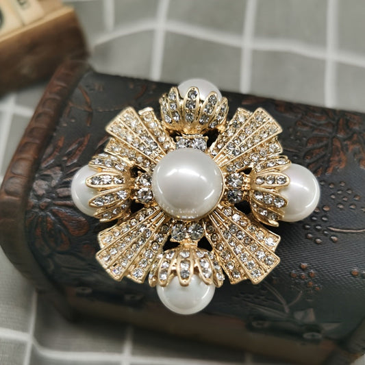 The stunning Enamel Flower Brooch, adorned with countless shimmering rhinestones and complemented by sophisticated imitation pearls, is a chic and trendy piece of jewelry for women that also makes the perfect gift. This versatile accessory pairs