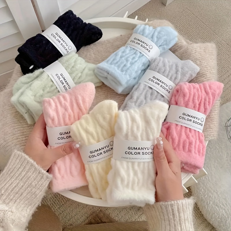 5 pairs of cozy knit socks for women made from a soft and warm blend of polyester (95%) and spandex (5%). Featuring a solid color twist pattern, these mid-calf socks are hand washable and