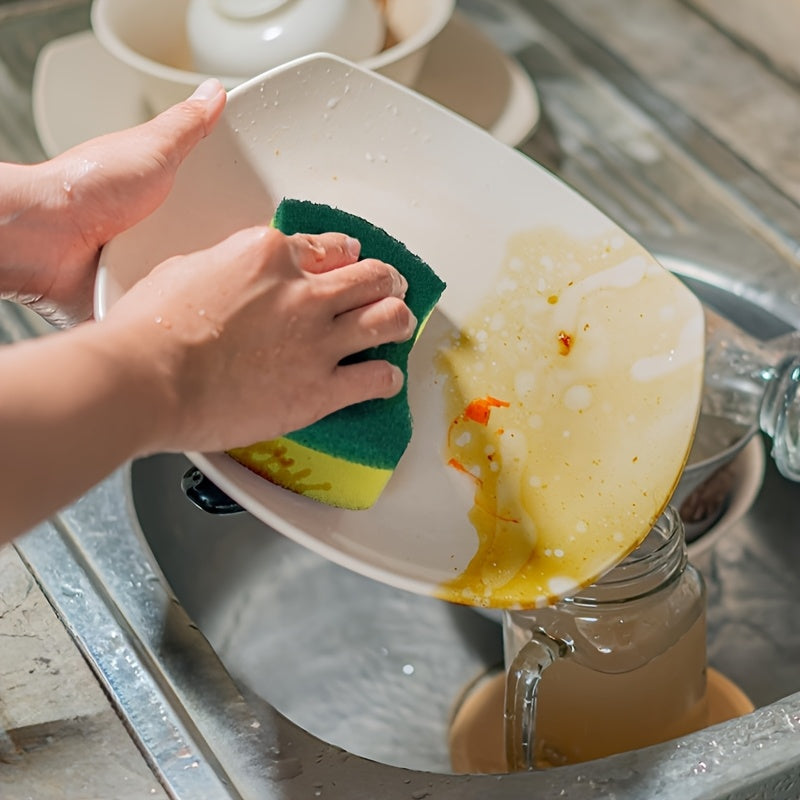 A versatile cleaning sponge with dual-sided scrubbing capability, perfect for all your home cleaning needs. This high-quality kitchen sponge is durable and non-scratch, ensuring efficient cleaning while being gentle on surfaces. With high absorbency