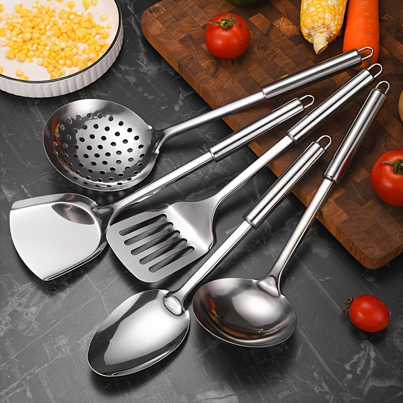 Set of stainless steel cookware and kitchen utensils, including a spatula, soup ladle, strainer spoon, Turner, and rice spoon. Durable and versatile cooking tools that do not require electricity for food preparation.