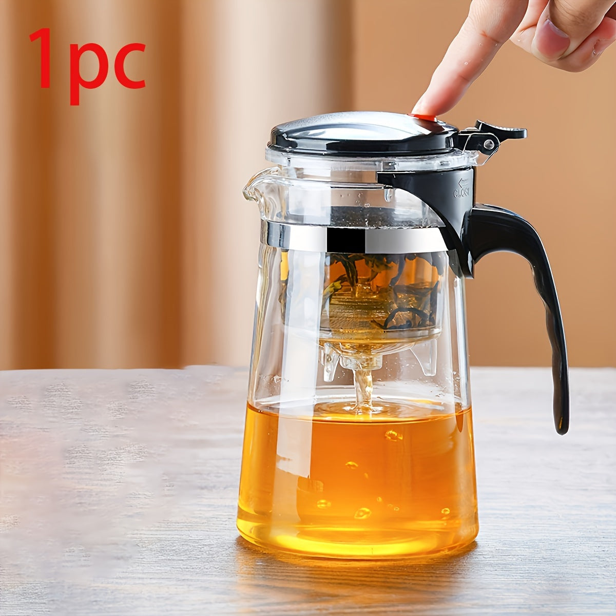 Elegant glass teapot with easy one-button infuser, perfect for loose leaf and blooming tea in home, office, or restaurant.