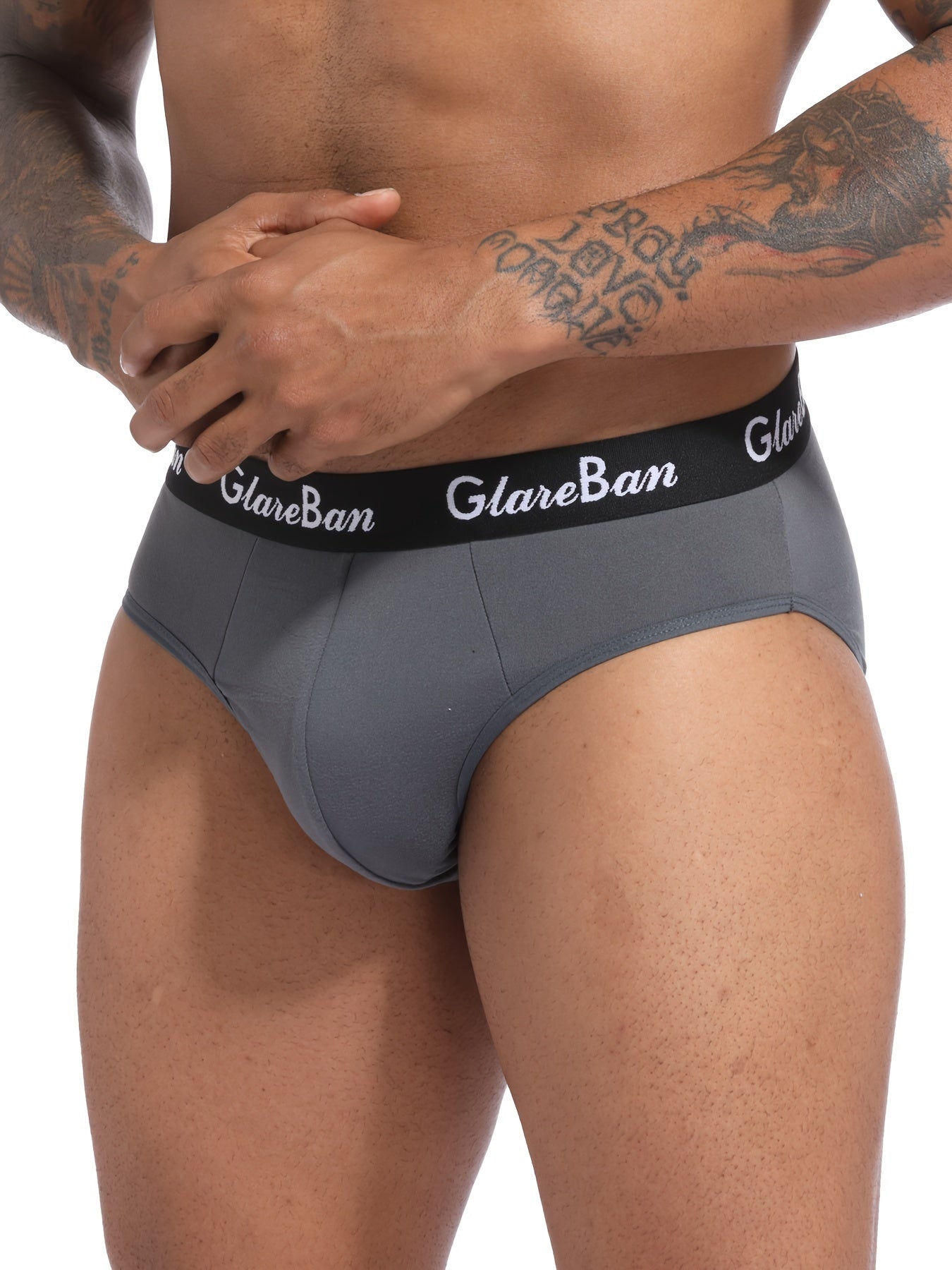 3 pack of men's underwear in dark gray, navy blue, and black with "GLAWNBAN" waistband, made of comfortable polyester blend. Stretchy, breathable, and supportive. Machine washable with