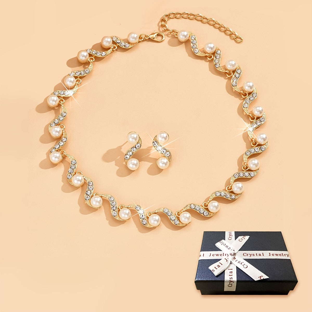 Stunning imitation pearl and diamond jewelry set, ideal for brides to wear on their special day.