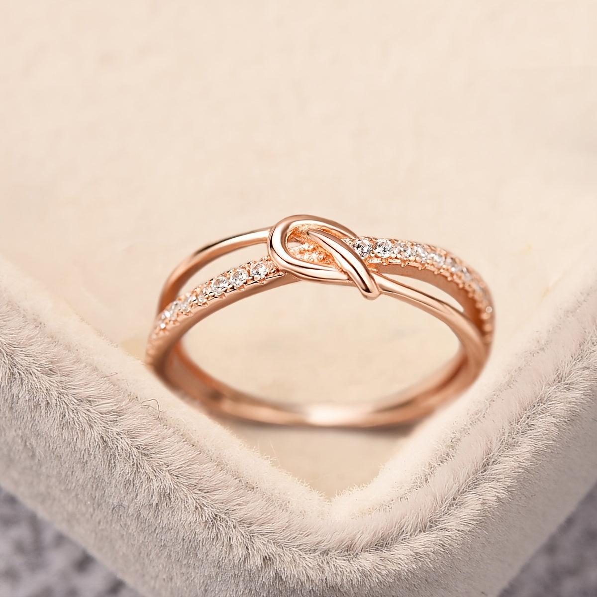 Elegant 925 Sterling Silver Double Knotted Ring with Rose Golden Plating and Synthetic Zirconia, a Luxurious Piece of Women's Jewelry Suitable for Daily Wear and Vacation. Makes for the Perfect Valentine's Day Gift.