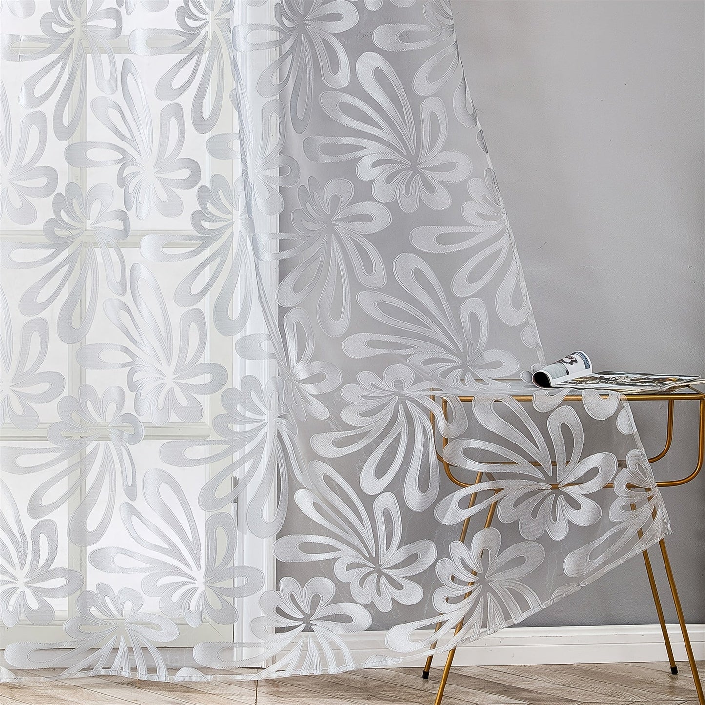 This Elegant Geometric Sheer Curtain Panel in Brown & White Floral Jacquard Design is made of lightweight polyester. It is machine washable and comes with eyelets for easy hanging. Ideal for enhancing the decor of your living room or bedroom.