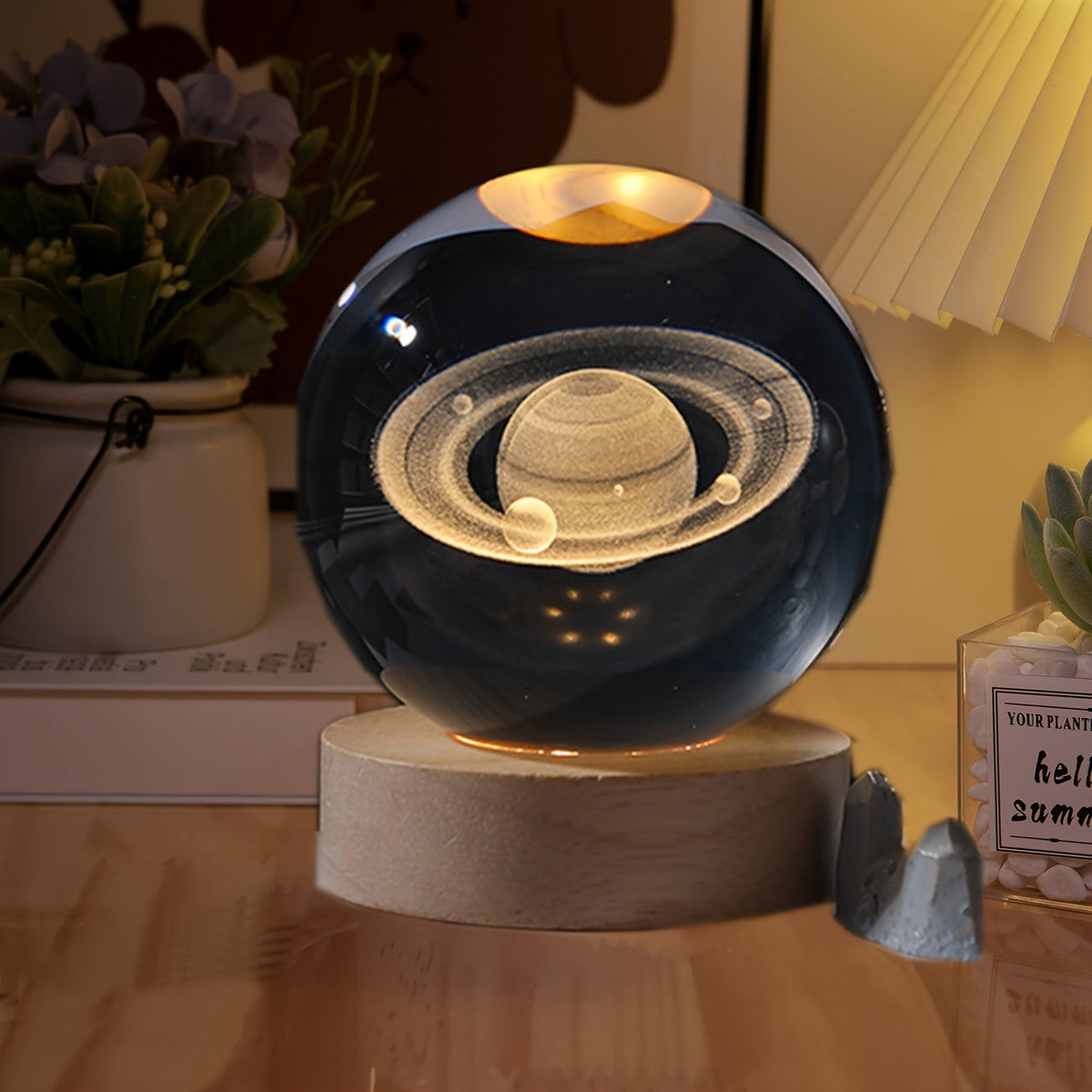 USB-powered Crystal Saturn night light emits celestial glow.