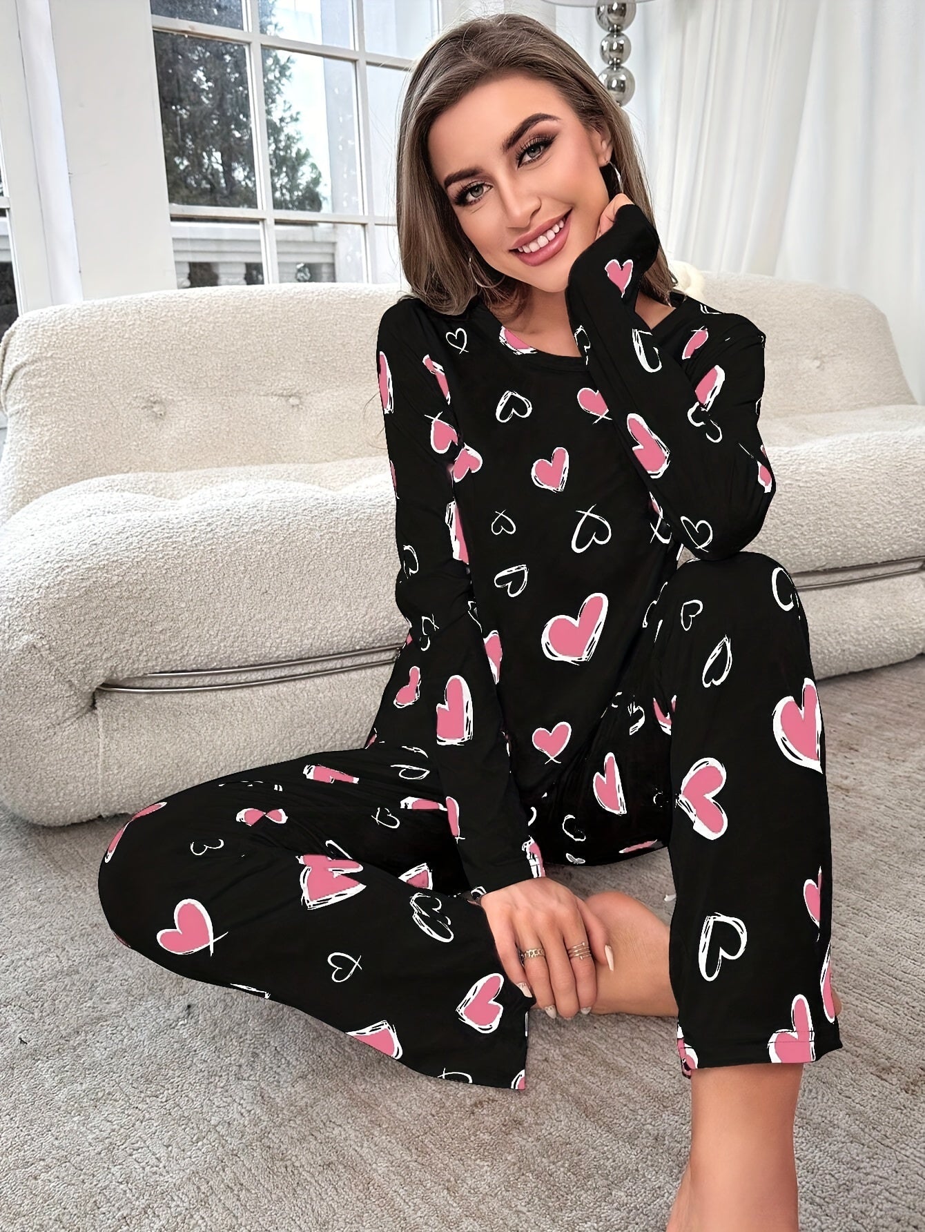 Heart print pajama set for women - cozy knit fabric with stretch - crew neck top and pants loungewear for all-season comfort.