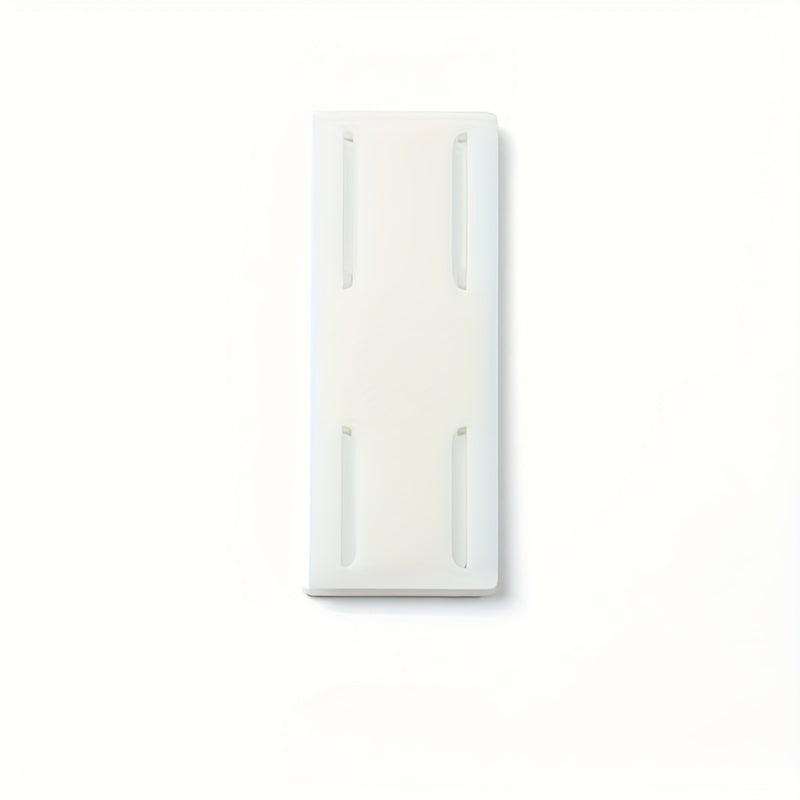 Wall-mounted storage for sockets with adhesive backing, suitable for various rooms and spaces such as living rooms, bedrooms, offices, bookshelves, and storage boxes. This socket holder requires no punching and leaves no trace when removed.